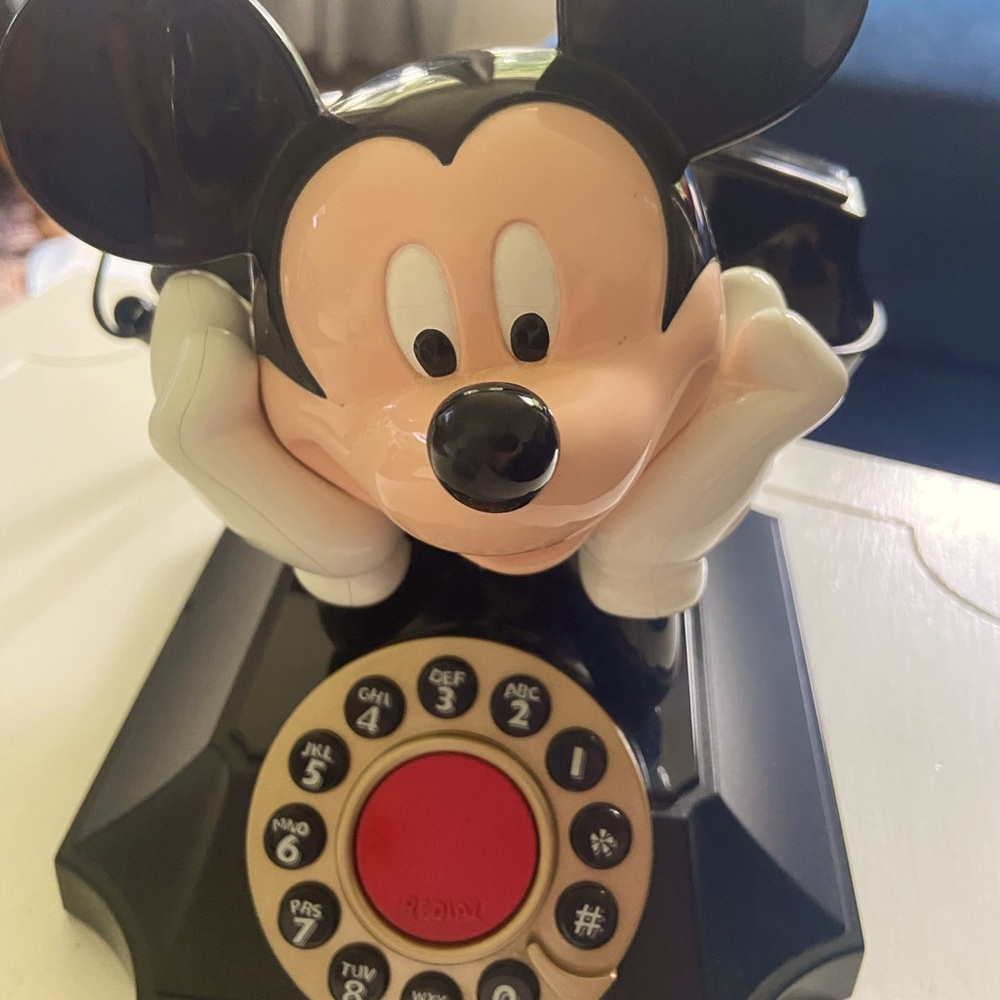 Vintage Mickey Mouse phone 9 inches tall 7 inches wide and 8 1/2 long.